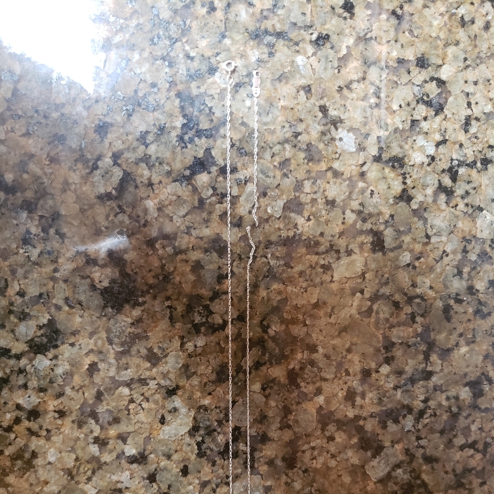 14K white gold rope chain broken.
